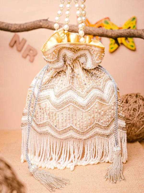 NR By Nidhi Rathi Cream-Coloured & Gold-Toned Embellished Potli Clutch